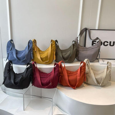 Sac bandoulière multipoches