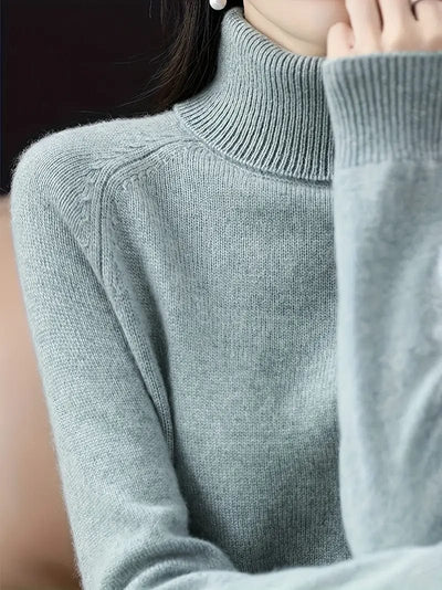 Pull col roulé intemporel