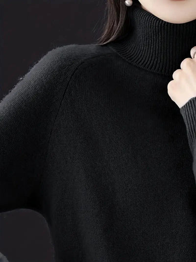 Pull col roulé intemporel