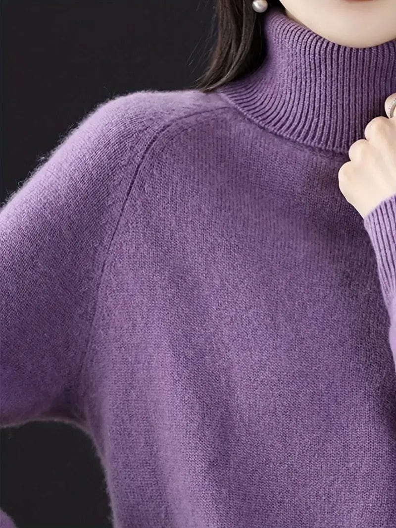 Pull col roulé intemporel