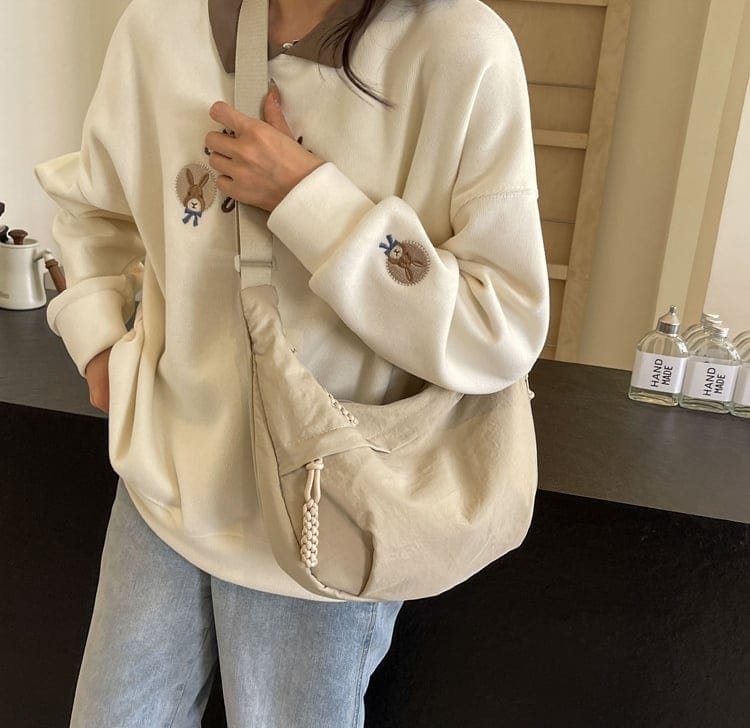 Sac bandoulière multipoches