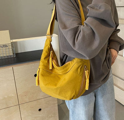 Sac bandoulière multipoches